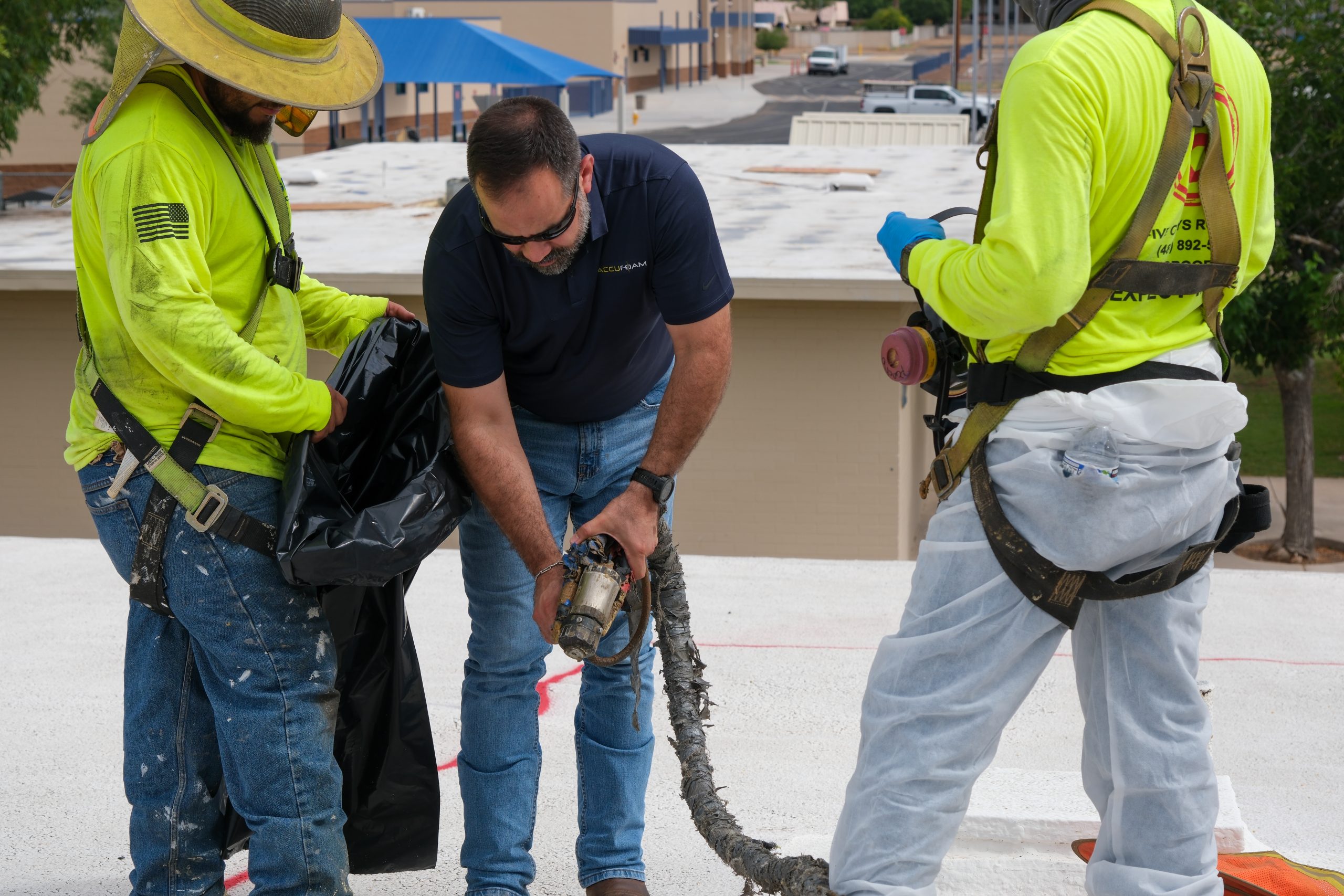 Tech team helping contractors on the job